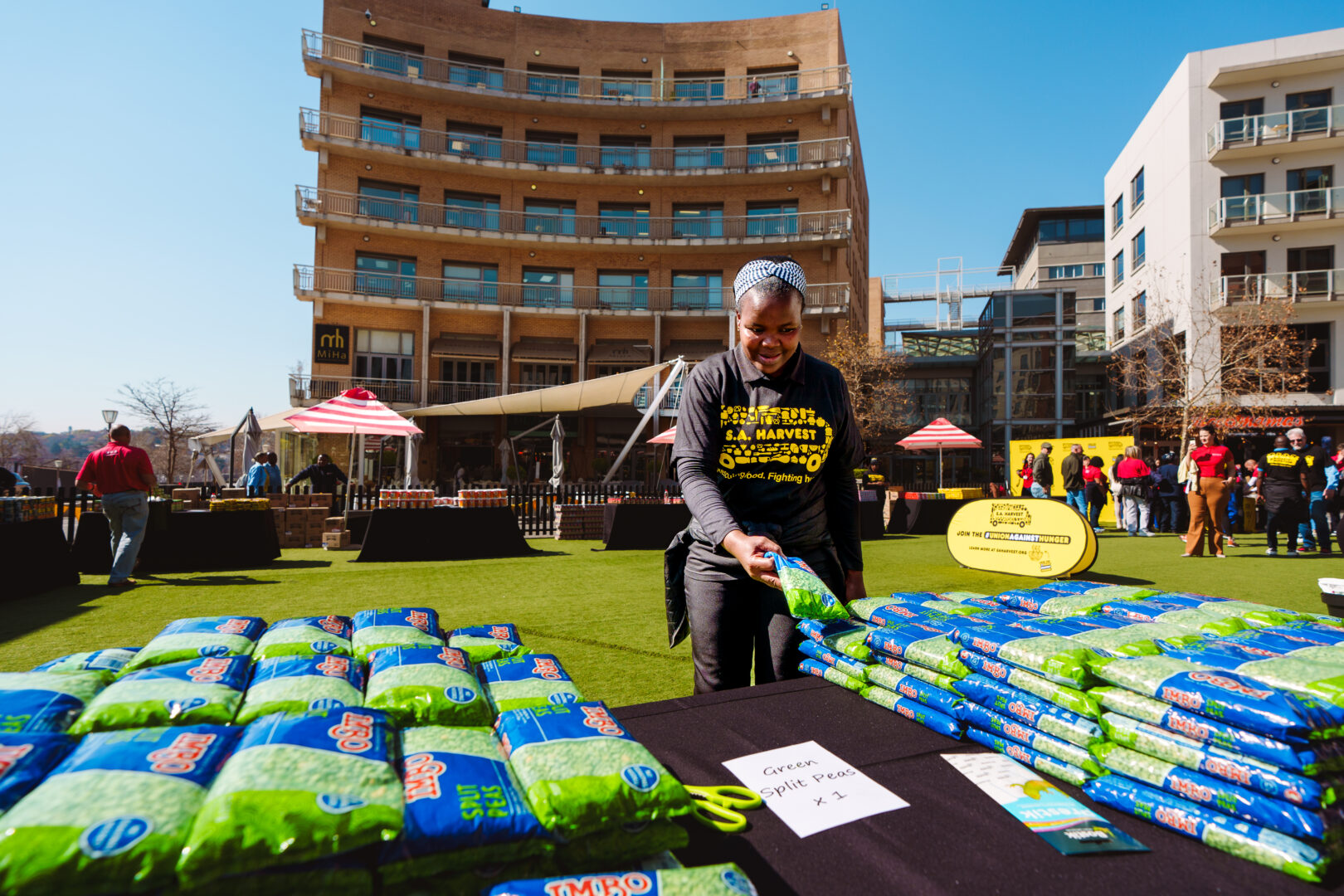Packing buckets of nutrition at Melrose Arch in 2024