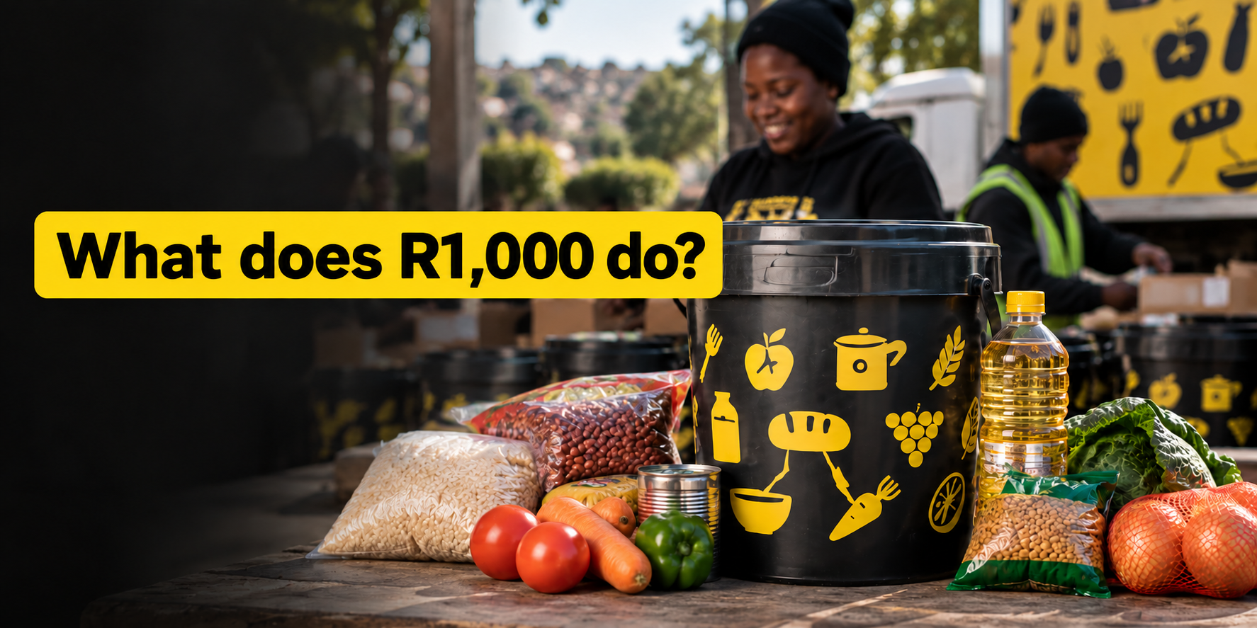 A black-and-yellow SA Harvest bucket surrounded by rice, beans, cooking oil and fresh produce as representatives pack more buckets. Text reads: “What does R1,000 do?”
