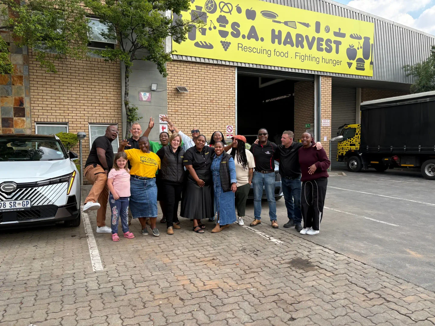 Katlego Mabusela and his team with SA Harvest staff at our Johannesburg warehouse during the 40for40 bucket handover.